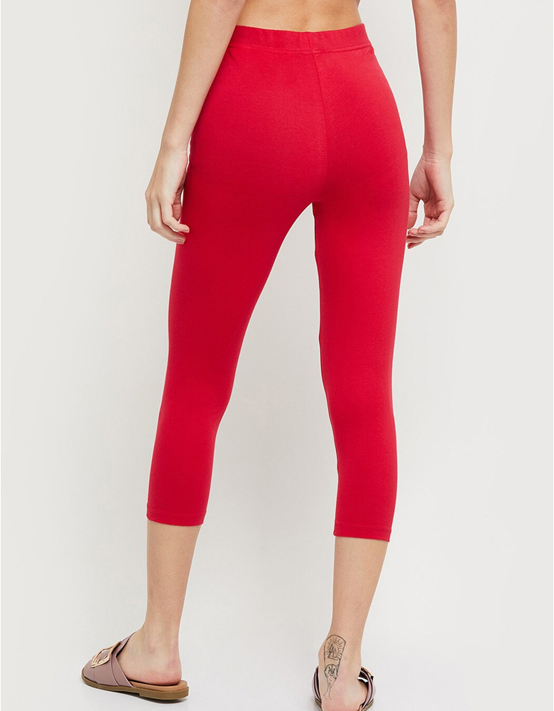 Women Fuchsia Red Solid Three-Quarter Length Leggings